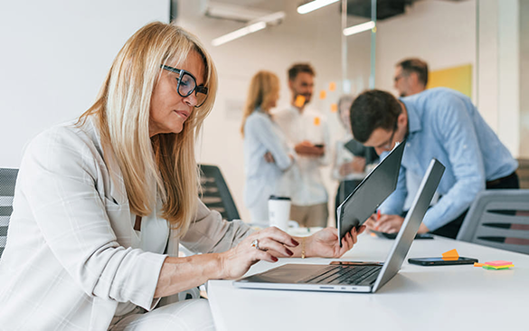 Woman working on laptop in office